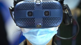 A woman wears a virtual reality headset