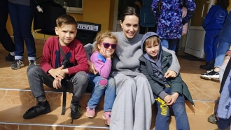 Angelina Jolie, Hollywood movie star and UNHCR goodwill ambassador, poses for photo with kids in Lviv, Ukraine.