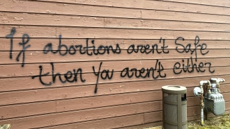 Threatening graffiti at the Wisconsin Family Action offices in Wisconsin