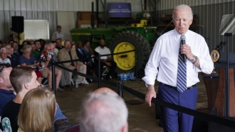 Biden Marks COVID 'Tragic Milestone' In U.S. At Global Summit
