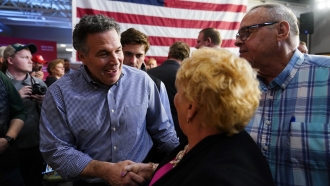 David McCormick, a Republican candidate for U.S. Senate in Pennsylvania, meets with attendees during a campaign stop