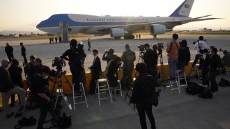 Members of the press near Air Force One