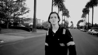 Music artist Semler walks in a music video.