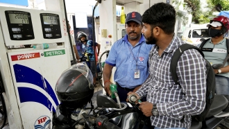 Motorcyclists at a fuel station