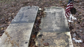 Two headstones are shown.
