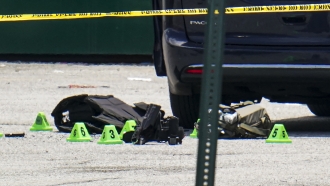 Body armor and evidence markers at the scene of a mass shooting