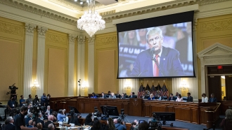 An image of former President Donald Trump is displayed as the House select committee Jan. 6 hearing.