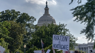 Abortion-rights and anti-abortion demonstrators gather outside of the Supreme Court