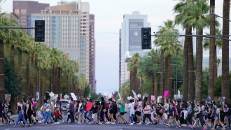 Protesters march near downtown Phoenix after the Supreme Court overturned Roe v. Wade