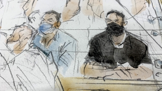 Sketch of key defendant Salah Abdeslam and Mohamed Abrini.