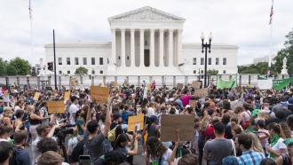 Protesters gather outside the Supreme Court in Washington, D.C.
