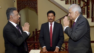 Sri Lanka's Prime Minister Sworn In As Interim President
