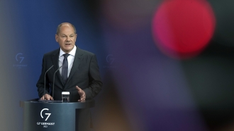 German Chancellor Olaf Scholz speaks during a press conference in Berlin.