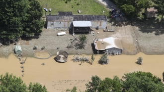 Homes in Breathitt County, Kentucky, surrounded by floodwater