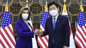 U.S. House Speaker Nancy Pelosi poses with South Korean National Assembly Speaker Kim Jin Pyo.