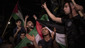 Palestinians celebrate the cease-fire agreement between Israel and Islamic Jihad Movement in Gaza City
