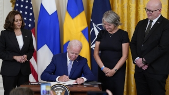 President Joe Biden signs the Instruments of Ratification for the Accession Protocols to the North Atlantic Treaty.