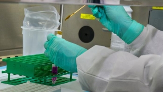 CDC scientists testing for poliovirus.