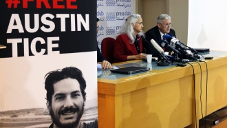 Marc and Debra Tice, the parents of Austin Tice, who is missing in Syria, speak during a press conference