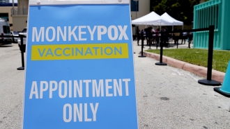 A sign for monkeypox vaccinations is shown at a vaccination site.