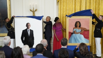 Former President Barack Obama and former first lady Michelle Obama unveil their official White House portraits