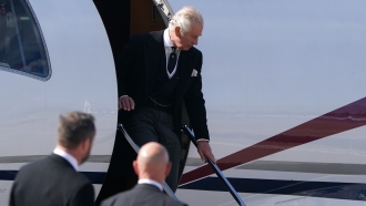 King Charles III arrives at Edinburgh Airport.