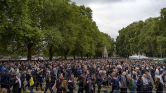 People form a miles-long line to pay their respects to the late Queen Elizabeth II.