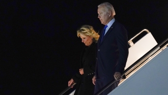 President Joe Biden and first lady Jill Biden arrive at London Stansted Airport.