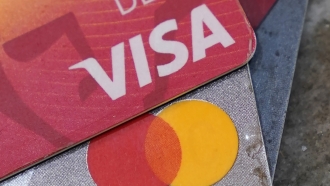 American Express, Visa and Mastercard cards on display