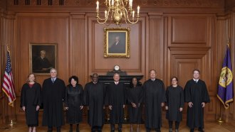 Members of the Supreme Court pose for a photo