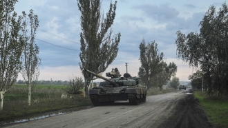 Ukrainian servicemen drive a tank on the way to Siversk, Donetsk region, Ukraine.