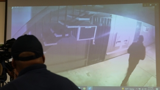 Stockton Police show a a brief video from a surveillance camera showing a person of interest