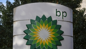 A logo for BP is seen at a gas station in London