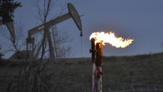 Flare to burn methane from oil production.