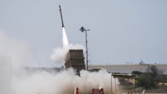 An Iron Dome air defence system launches to intercept a rocket fired from the Gaza Strip