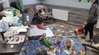 Babies inside the orphanage at Calvary Baptist Church in Kherson.