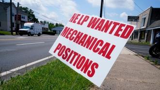 A help wanted sign.
