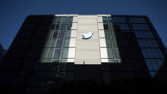 A Twitter logo hangs outside the company's San Francisco offices.