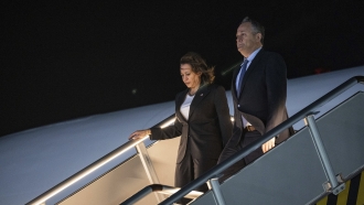 Vice President Kamala Harris and her husband Doug Emhoff arrive at Ninoy Aquino International Airport in Manila, Philippines.