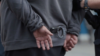 Suspect in handcuffs