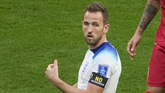 England's Harry Kane wears a black armband with a sign "No discrimination."
