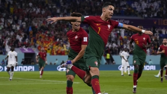 Portugal's Cristiano Ronaldo celebrates after scoring from the penalty.