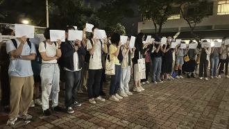 Students in Hong Kong chanted “oppose dictatorship” in a protest against China’s anti-virus controls