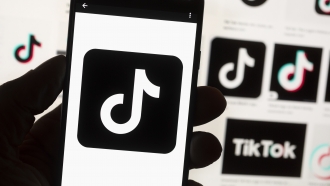 The TikTok logo on a cell phone