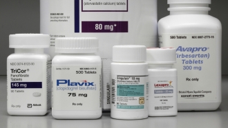 bottles of prescription drugs: Lipitor, TriCor, Plavix, Singulair, Lexapro and Avapro are displayed at Medco Health Solutions