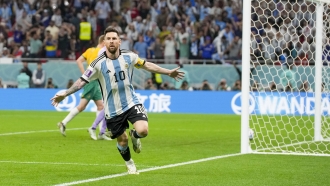 Argentina's Lionel Messi celebrates winning the World Cup round of 16 soccer match.