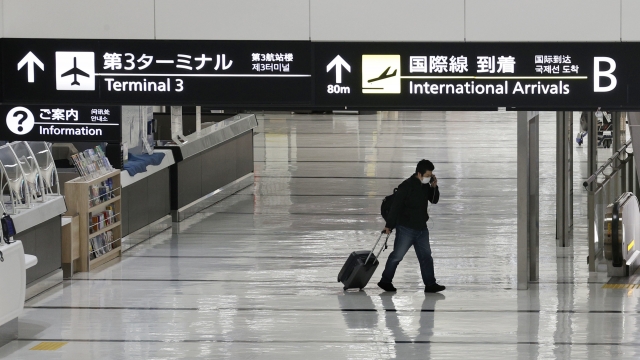 Japan Suspends New Flight Reservations As Omicron Spreads