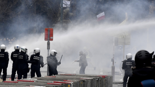 Police Fire Water Cannons, Tear Gas At COVID-19 Protests In Brussels