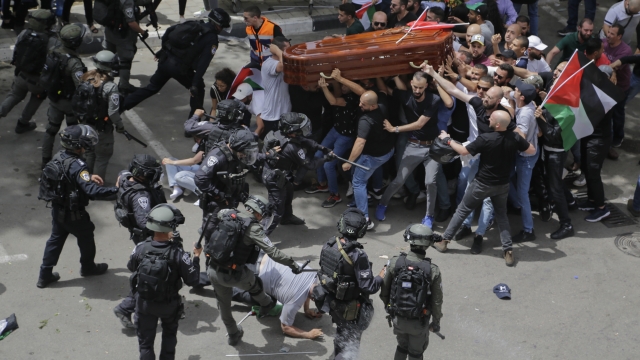 Israeli Police Beat Pallbearers At Journalist's Funeral