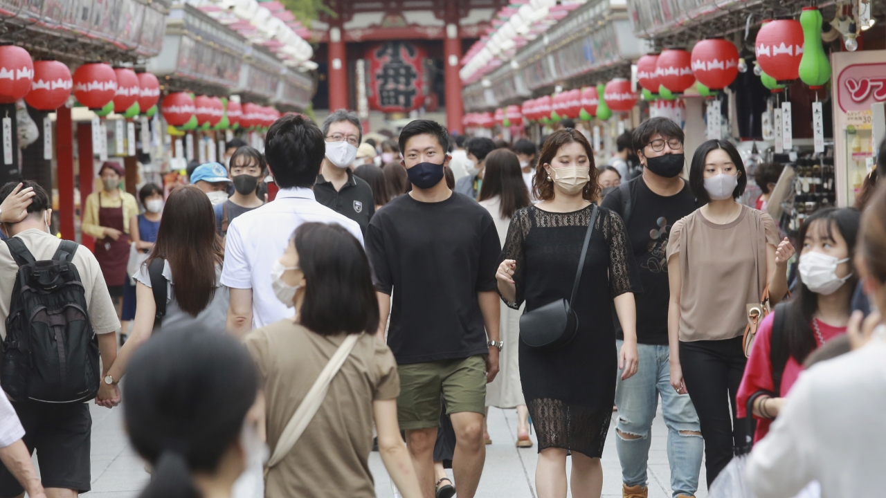People wearing face masks to protect against the spread of the coronavirus